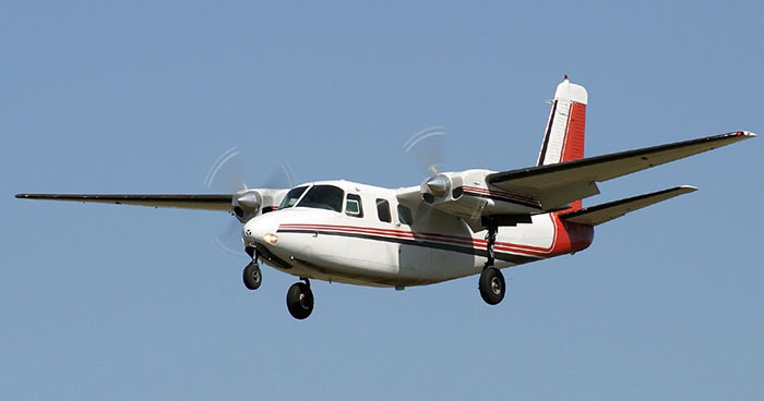 Book a Aero Commander 500 to fly from San Juan to Canouan